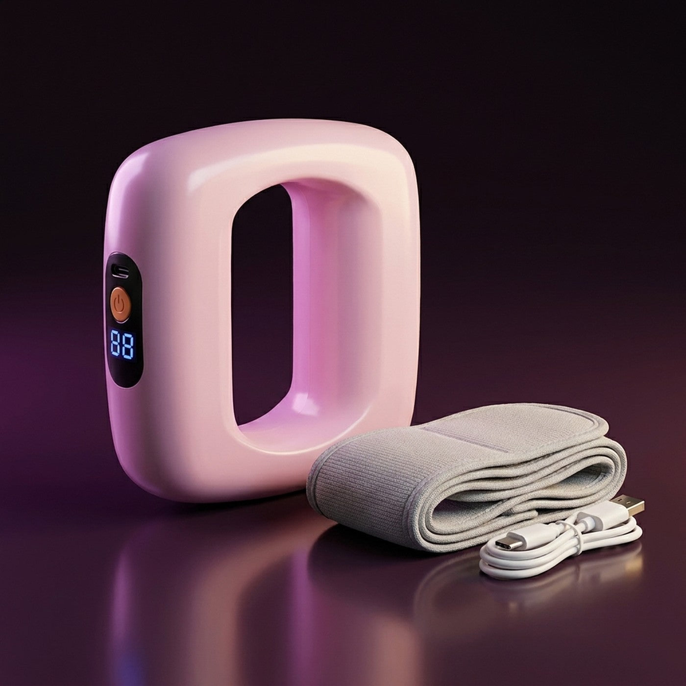 Orba anillo de masaje rosado con su cinturón gris y cable USB-C